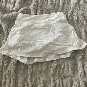 White Pace Rival Mid-Rise Lululemon skirt. Size 0, 12 inch inseam.